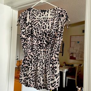 Brand new with tags leopard blouse. Sleeveless with fitted waist